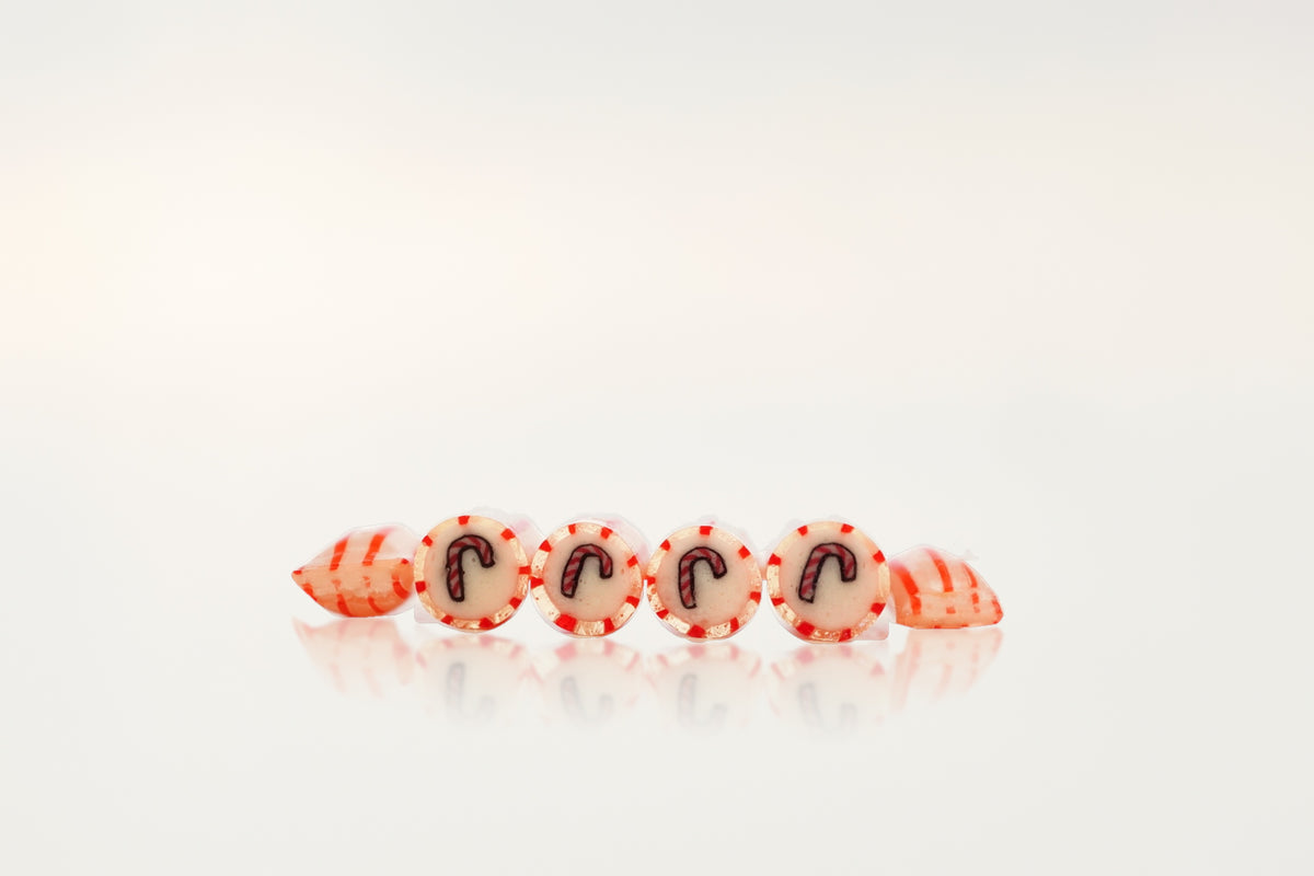 Candy cane raspberry handmade rock candies in a row – Candylabs