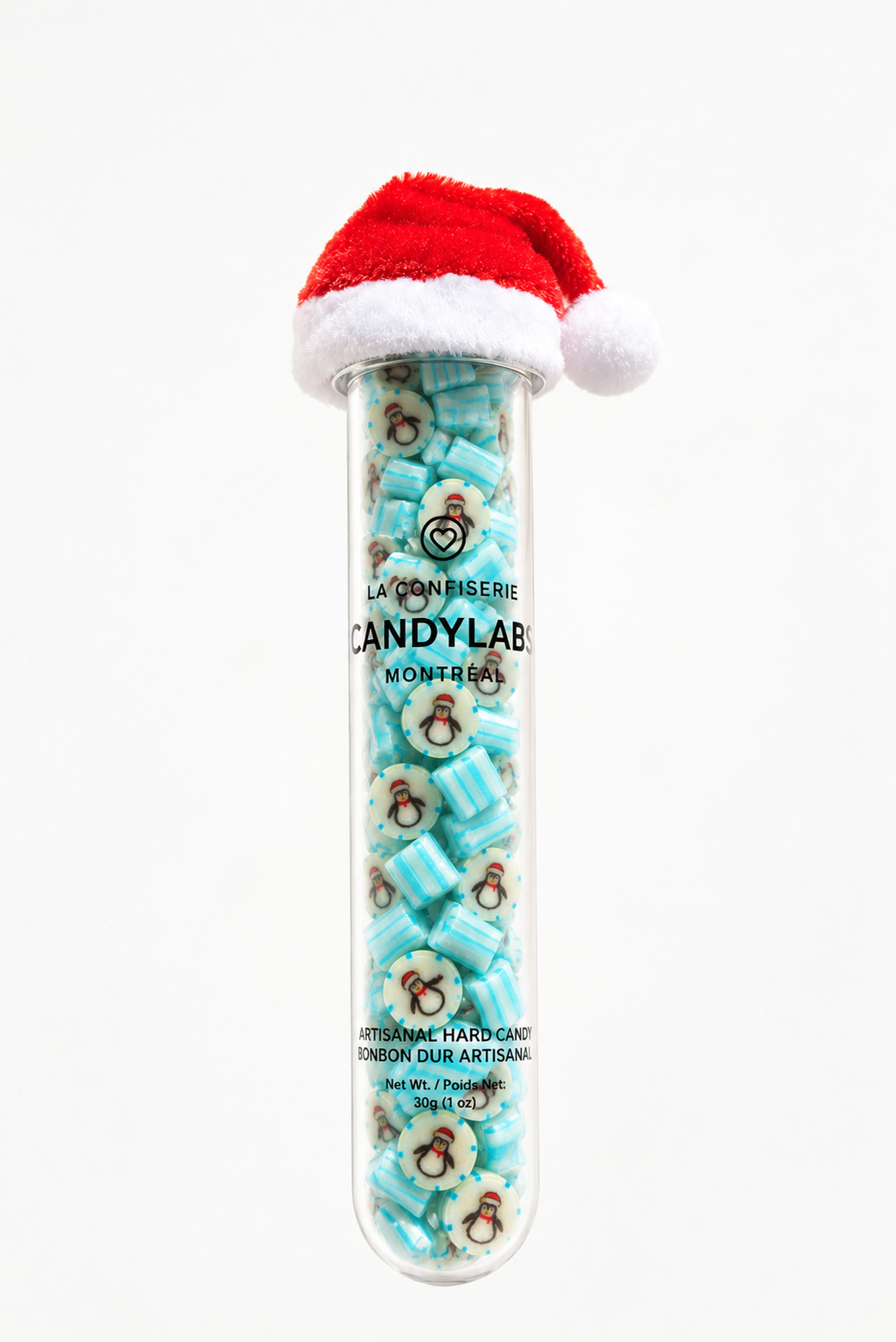 Holiday penguin pineapple handmade rock candy in a 30g tube with a free mini Santa hat – Candylabs