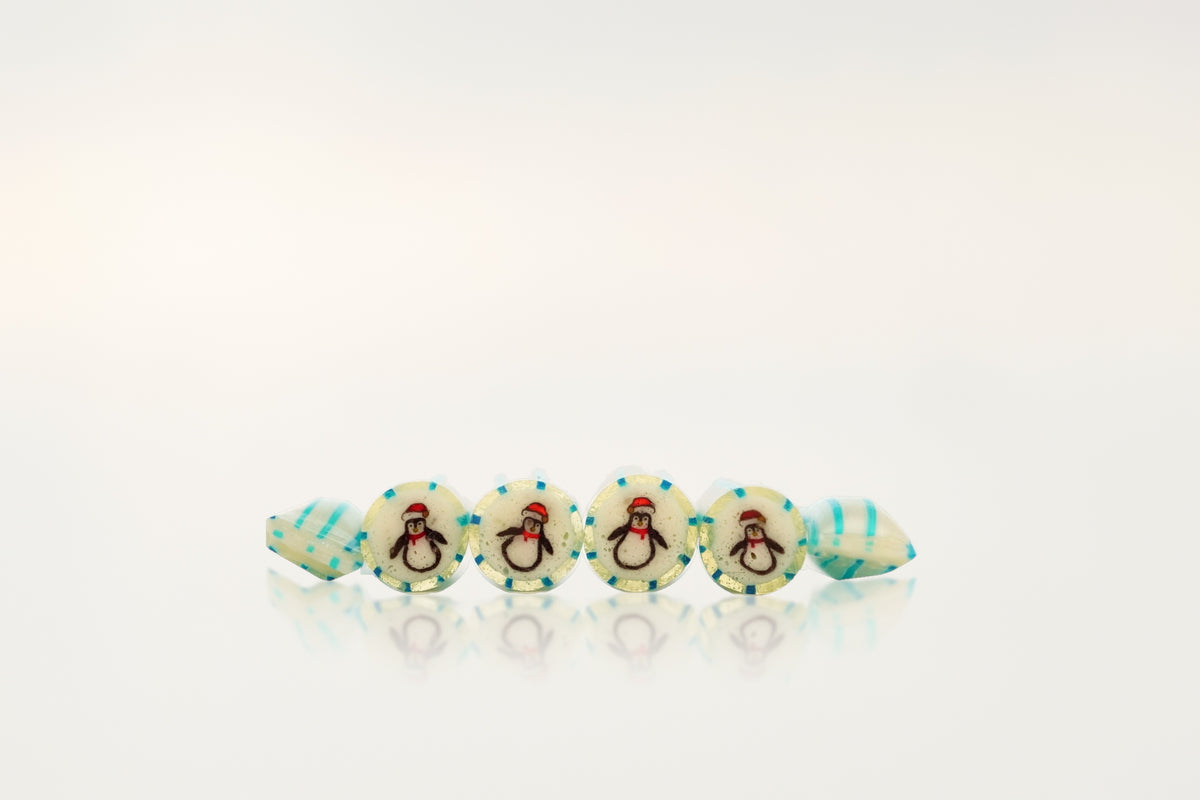 Holiday penguin pineapple handmade rock candies in a row – Candylabs